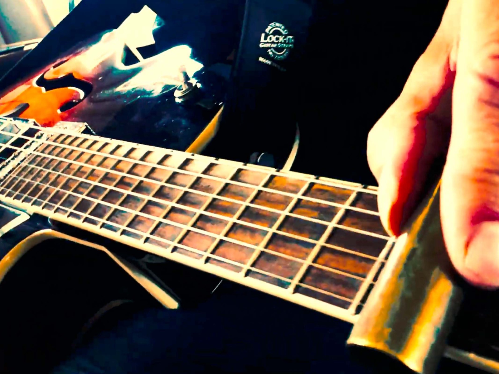 Guitar fretboard close up