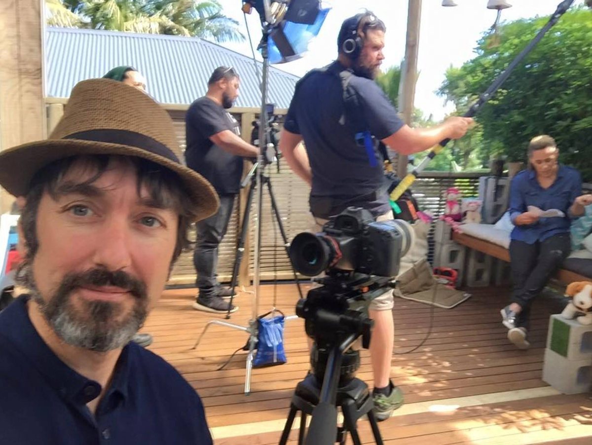 Andy McGrath on location with camera and sound crew